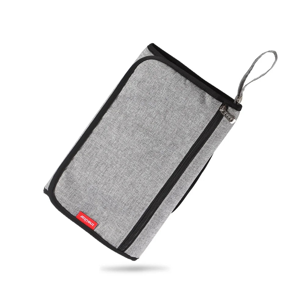 Matelas à langer nomade pliable 2-en-1 — Imperméable, sac de rangement intégré