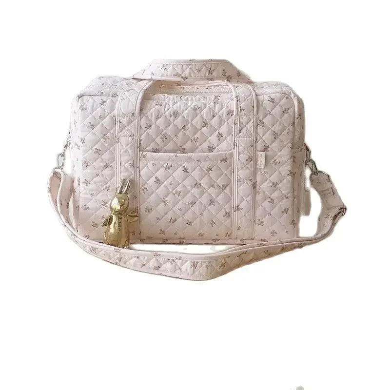 Sac à langer bandoulière fleuri — Coton matelassé floral portable – Maison Lunö
