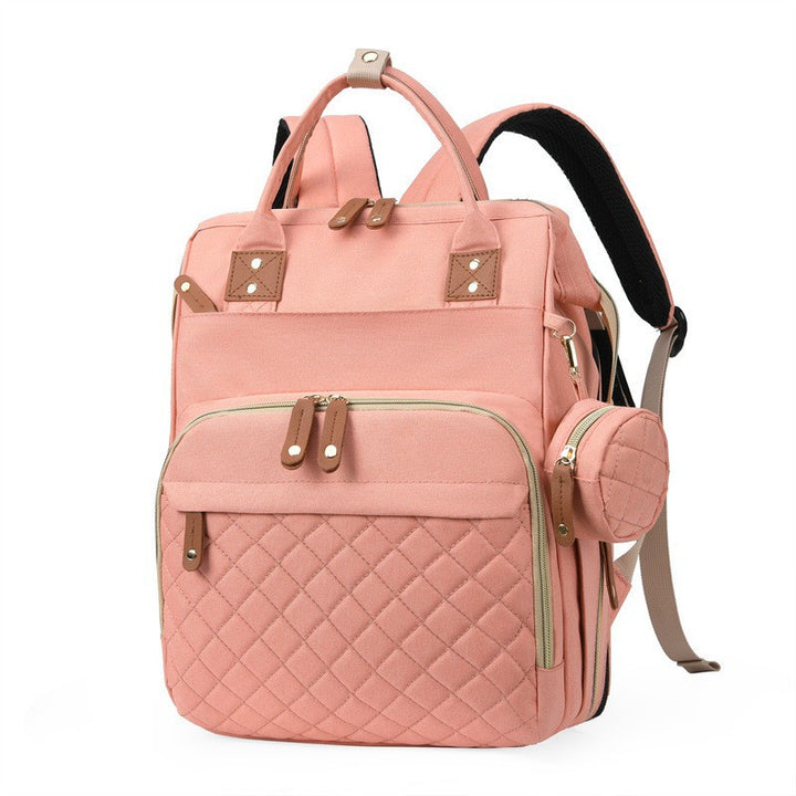 Sac à langer convertible 3 en 1 rose poudré - lit nomade et tapis à langer