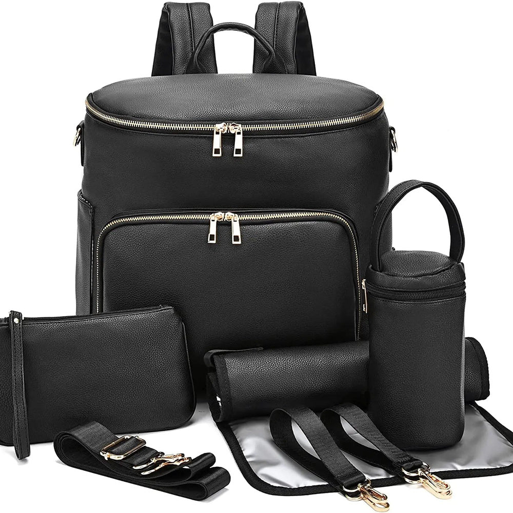 Sac à dos à langer en cuir Maison Lunö, coloris noir, avec ses accessoires