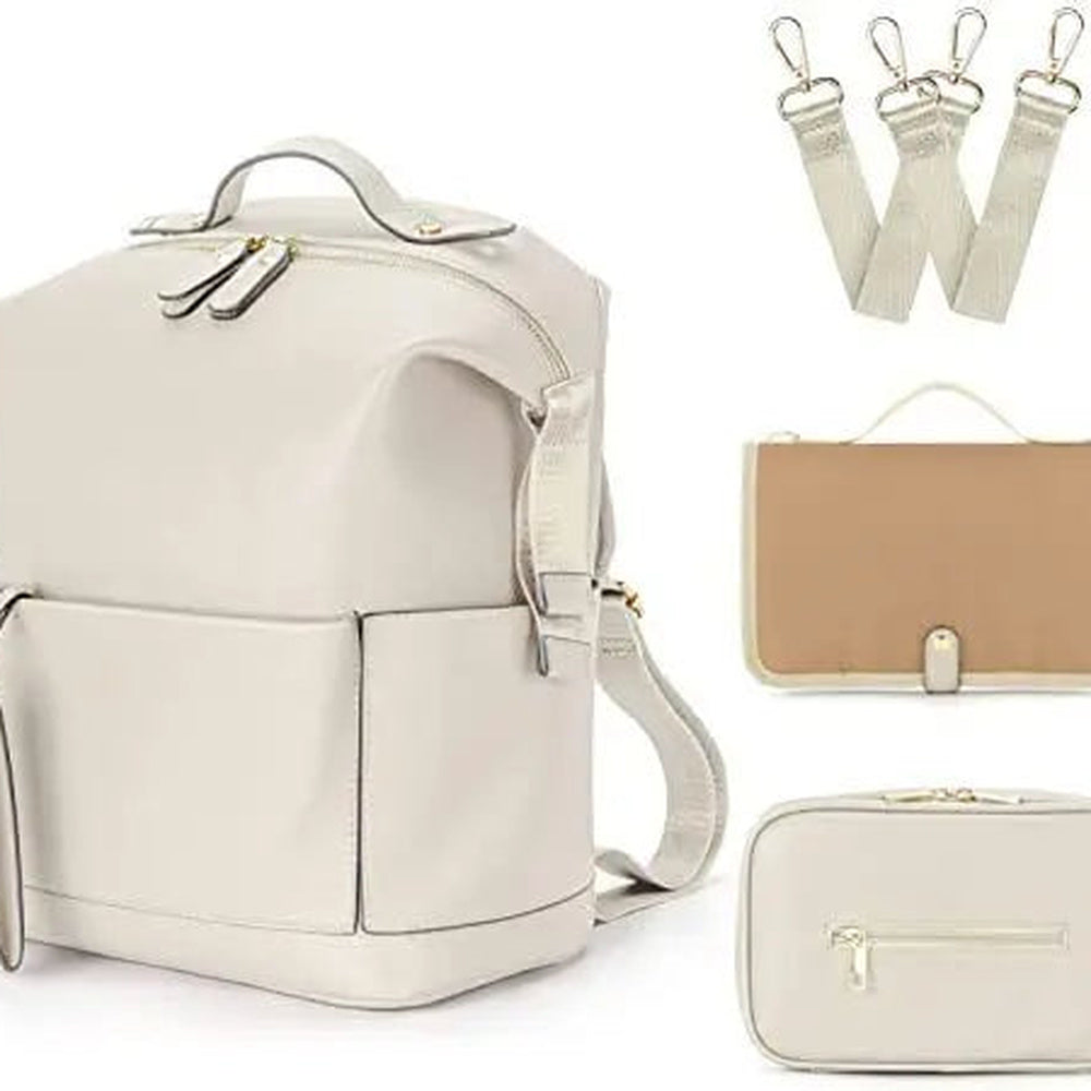 Sac à dos à langer en simili cuir Maison Lunö, coloris blanc, avec son tapis à langer et sa pochette isotherme