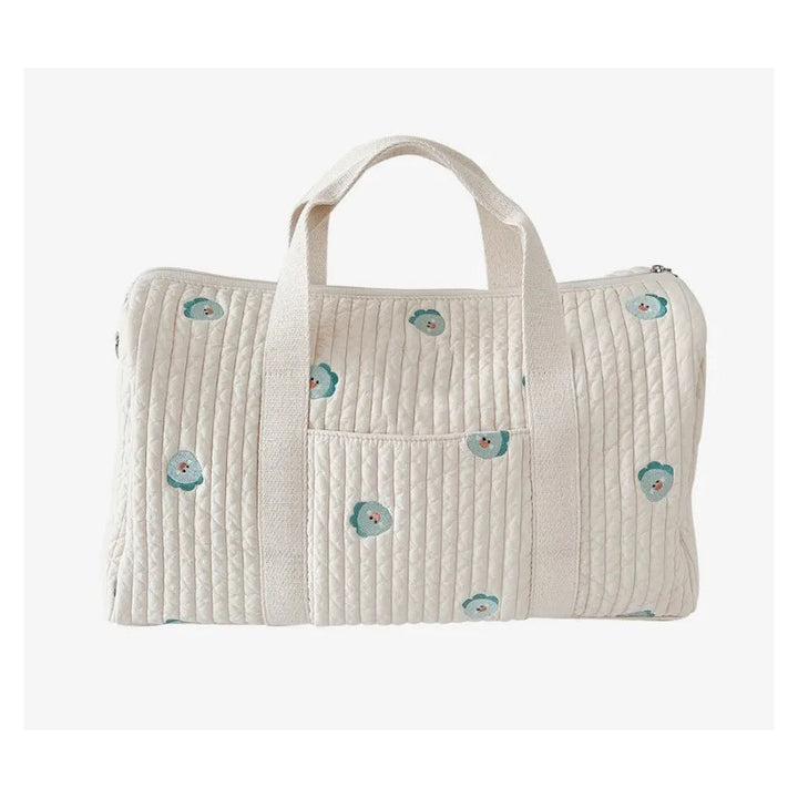 Sac à langer matelassé en coton Maison Lunö, broderies dinosaure