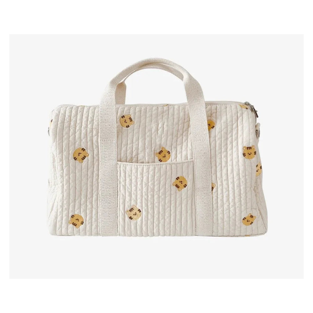 Sac à langer matelassé en coton Maison Lunö, broderies petit tigre
