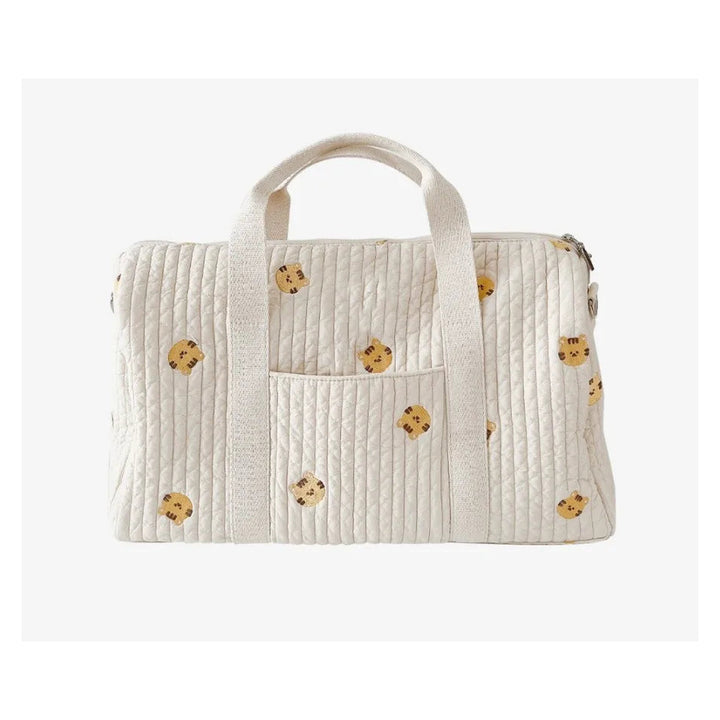 Sac à langer matelassé en coton Maison Lunö, broderies petit tigre