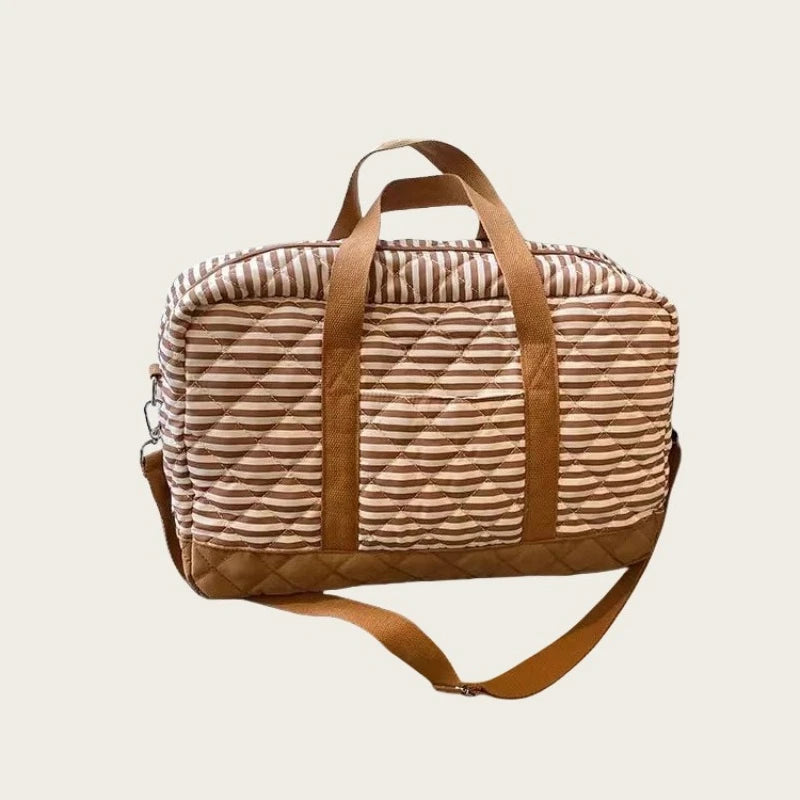 Sac à langer matelassé à porter épaule Maison Lunö, rayures marron et finitions cuir